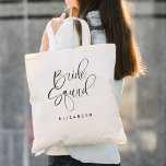 Tote Bag Bride Squad Bridesmaid Mariage de la calligraphie<br><div class="desc">Bride Squad Bridesmaid Calligraphy Mariage Sac fourre-tout présente une calligraphie amusante et jolie,  ainsi que le nouveau nom de famille de la mariée.</div>