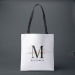Tote Bag Bridesmaid Cadeau Or Monogramme Blanc<br><div class="desc">Ce sac fourre-tout de Bridesmaid présente un monogramme manuscrit de typographie de script blanc et noir avec des swashes sur un arrière - plan rose poussiéreux. Présentez vos serveuses d'honneur avec un fourre-tout pour transporter des objets le jour du mariage,  et traditionnellement présentés au dîner de répétition ou avant.</div>