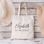 Tote Bag Bridesmaid Moderne Minimaliste Script Bachelorette<br><div class="desc">Élevez votre bachelorette avec notre collection "Bridesmaid Modern Minimalist Script". Cette ligne de produits exquise incarne l'élégance contemporaine et le style intemporel, parfait pour célébrer vos nouveautés d'une manière moderne et sophistiquée. Notre design de script minimaliste place vos servantes d'accueil à l'avant-garde, ajoutant une touche de classe à chaque élément....</div>