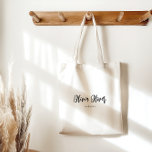 Tote Bag Calligraphie de script minimaliste Crème d'ivoire<br><div class="desc">Élevez votre transport quotidien avec notre minimaliste Sac fourre-tout de script en noir et ivoire. Le design chic offre un grand espace propre pour les notes manuscrites ou les touches personnelles, tandis que l'élégante calligraphie de script ajoute une touche sophistiquée. Ce fourre-tout est le parfait mélange de style et de...</div>