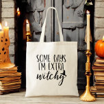 Tote Bag Certains jours je suis une cuisine supplémentaire<br><div class="desc">Ajoutez une touche de sass à votre style grâce à notre Sac fourre-tout d'Halloween féminin moderne "Certains jours je suis en cuisine" ! Ce fourre-tout noir chic présente la phrase ludique dans une typographie élégante et moderne, parfaite pour exprimer son côté sorcier. Fabriqué à partir de matériaux durables, il est...</div>