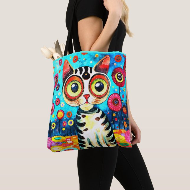 TOTE BAG CHAT COUPANT AVEC GRANDS YEUX DESIGN ABSTRAIT (De près)