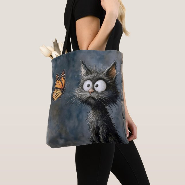 Tote Bag Chat dépenaillé fixant un papillon (De près)