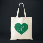 Tote Bag Cœur vert Kelly Monogramme<br><div class="desc">Ce sac fourre-tout présente un cœur vert Kelly avec une initiale monogrammée blanche en son centre. Personnalisez-le en redimensionnant/repositionnant le cœur vert et/ou en personnalisant le texte/monogramme. Excellent cadeau pour une demoiselle d'honneur.</div>