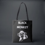 Tote Bag Cute Little Black Monkey<br><div class="desc">Meet your new favorite jungle friend! This adorable peeking monkey design features a clean, white illustration that pops perfectly on dark fabrics. A fun and playful choice for kids, wildlife enthusiasts, or anyone who loves a bit of monkey business.</div>