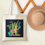 Tote Bag Cute Llama dans le Jardin de Cactus avec Fleurs Ja<br><div class="desc">Cute scène de lama en aquarelle, que vous pouvez personnaliser avec votre nom ou texte personnalisé. Cette jolie lama blonde a une fleur et des plumes dans les cheveux, une guirlande assortie et un tapis traditionnel péruvien. Elle est debout dans un jardin de cactus fleuri avec de jolies fleurs jaunes....</div>