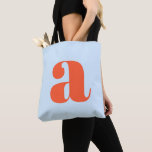 Tote Bag Cute Soft Blue Orange Monogram Retro Lettering<br><div class="desc">This stylish tote bag features your monogram in orange on a soft blue background in retro lettering. Great gift idea!</div>