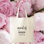 Tote Bag Demoiselle d'honneur / Cadeau personnalisé pour la<br><div class="desc">Célébrez votre demoiselle d'honneur avec ce chic sac fourre-tout « Maid of Honor » qui présente une élégante écriture noire sur le devant avec la date de votre mariage en dessous. Le dos est personnalisé avec le nom de la demoiselle d'honneur, créant un souvenir attentionné et élégant qu'elle aimera longtemps...</div>