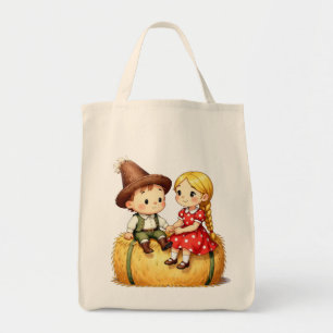 Tote Bag Des enfants de la campagne sur une botte de foin