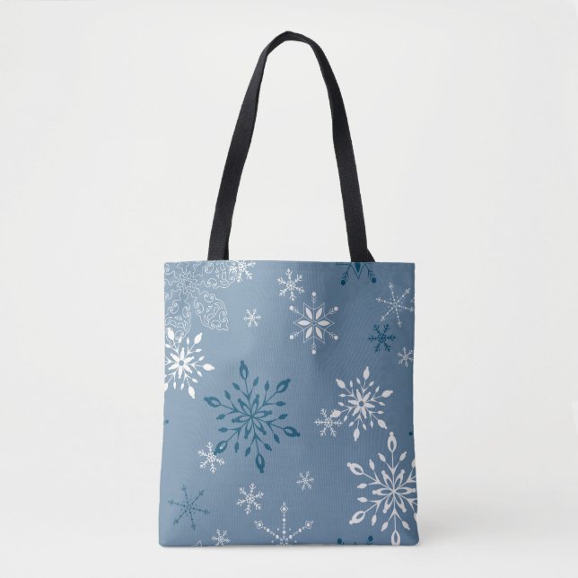 Tote Bag Des flocons de neige sur un arrière - plan bleu (Devant)