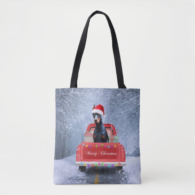 Tote Bag Doberman Chien en neige assis sur un camion de Noë (Devant)