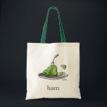 Tote Bag Dr. Seuss | Les Œufs verts au jambon<br><div class="desc">Ce design sous licence officielle de Dr. Seuss présente une illustration amusante et classique des œufs et du jambon verts emblématiques sur un plat. L'œuvre d'art met en valeur le célèbre jambon vert avec une fourchette posée à l'intérieur, aux côtés des œufs verts rebondissants, et est complétée par le simple...</div>
