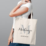 Tote Bag Elegant Gray Black Custom Wedding Bridesmaid Name<br><div class="desc">Elegant custom wedding tote bag features a personalized monogram typography design with modern calligraphy script name and serif monogram initial in silver gray and black colors. Includes custom text for a bridal party title like "BRIDESMAID" or other preferred wording.</div>