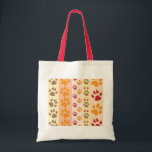 Tote Bag Empreintes de pattes Amoureux de les chiens mignon<br><div class="desc">Conception avec un motif mignon d'empreintes de pattes de chien dans les couleurs orange et jaune et chaud. Ce design ressemble à un chien qui a parcouru le produit ! Pour les amoureux de les chiens partout.</div>