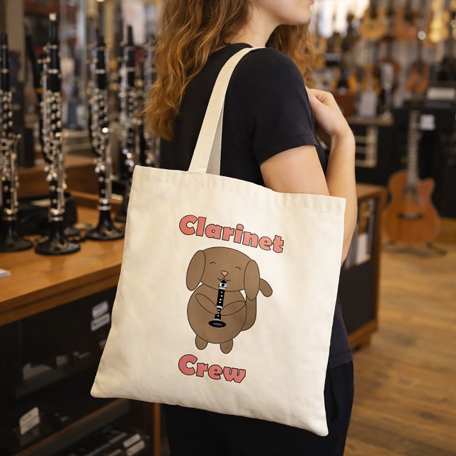 Tote Bag Équipage de clarinette mignon Chien marron (A tote bag with a cute dog playing the clarinet and the words clarinet crew.)
