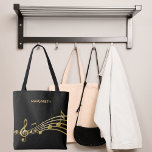 Tote Bag Faux notes de musique or sur fond noir chic<br><div class="desc">Simple et élégant pour les mélomanes ! Arrière - plan noir avec des notes de musique faux or. Modèle pour votre nom,  écriture de style manuscrite dorée.</div>