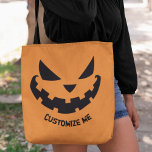 Tote Bag Fête d'Halloween Orange Personnalisé Jack-o'-lante<br><div class="desc">Ce sac fourre-tout d'Halloween orange éffrayant pour le tour ou le traitement présente un cool souriant Jack-o'-lantern et votre propre texte personnalisé. Sacs de fête personnalisés mignons et effrayants à utiliser pour le tour,  le traitement ou les faveurs de fête.</div>
