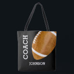 Tote Bag Football vintage d'entraîneur de football<br><div class="desc">Sac fourre-tout personnalisé par football vintage à entraîneur de football américain le rétro. Ce football de style d'aquarelle est une conception rocailleuse vintage parfaite pour des entraîneurs de football américain d'école. Concevez des deux côtés, texte est dans la police blanche facile à lire sur un fond noir. Changez l'arrière -...</div>