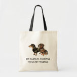 Tote Bag Funny Dachshund Dog | Tripping Over My Weiner<br><div class="desc">This adorable Doxie tote celebrates our millennia-long history of friendship, loyalty, and companionship with our furry best friends. Perfect for any dachshund lover! Add your custom wording to this design by using the "Edit this design template" boxes on the right hand side of the item, or click the blue "Customize...</div>