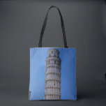 Tote Bag Gift Bag<br><div class="desc">This captivating photograph showcases the iconic Leaning Tower of Pisa standing elegantly against a deep blue twilight sky in Pisa. The historic marble tower, famous for its unmistakable tilt, is beautifully illuminated, highlighting its intricate Romanesque arches and layered columns. The soft evening light creates a striking contrast between the glowing...</div>