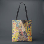Tote Bag Gustav Klimt Lady With Fan Art Nouveau Painting<br><div class="desc">Dame Gustav Klimt avec peintre Art Nouveau Fan Ce demi-portrait d'une belle femme montre un arrière - plan jaune avec des ornements asiatiques, des oiseaux colorés et des fleurs de lotus. La dame porte une robe dans le style d'un kimono imprimé des motifs d'une robe de dragon chinoise. Belle peinture...</div>