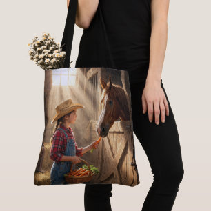 Tote Bag Jeune fille nourrissant un cheval avec des carotte