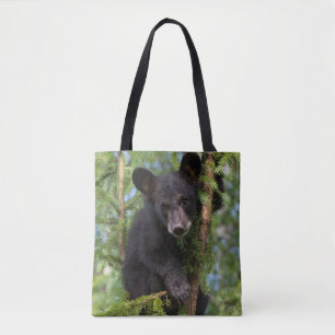 Tote Bag Jeune ours noir jouant dans les arbres