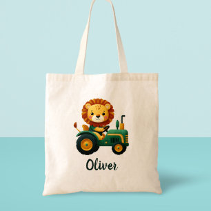 Tote Bag Joli lionceau sur un charmant tracteur vert