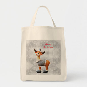 Tote Bag Joyeux Noël orignal portant un chapeau