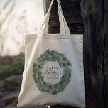 Tote Bag La couronne d'arbre à pinecone Joyeuses fêtes<br><div class="desc">Pine Tree Wreath Winter Holiday Sac fourre-tout avec texte personnalisé. Pour une personnalisation plus avancée de cette conception,  cliquez sur le BOUTON OUTIL DESIGN BLEU. Des articles correspondants sont également disponibles.</div>