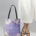 Tote Bag Lavender Floral Spring Wedding Mariages Mariages M<br><div class="desc">Les motifs floraux d'aquarelle sont devenus de plus en plus populaires dans le monde des mariages. Ce design présente des traits doux et délicats d'aquarelle en blanc et en lavande qui évoquent un sentiment de romantisme et d'élégance. La combinaison de couleurs pastel et vibrantes donne à cette suite mariage une...</div>