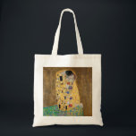 Tote Bag Le baiser de Gustav Klimt<br><div class="desc">The Kiss by Gustav Klimt The Kiss est une peinture à l'huile sur toile avec de la feuille d'or, de l'argent et du platine. par le peintre symboliste autrichien Gustav Klimt. Il a été peint à un moment donné en 1907 et 1908, au plus fort de ce que les savants...</div>