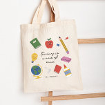 Tote Bag L'enseignement est une oeuvre de coeur<br><div class="desc">Présentant notre sac fourre-tout enchanteur conçu exclusivement pour les enseignants qui inspirent et nourrissent les jeunes esprits. Ce sac fourre-tout allie praticité, personnalisation, et une touche de fantaisie, en faisant un accessoire parfait pour les éducateurs avec une passion pour l'enseignement. La pièce maîtresse de ce design de sac fourre-tout est...</div>