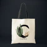 Tote Bag Lettre boho C Monogramme Aquarelle Tropical Cactus<br><div class="desc">Sac fourre-tout monogramme de lettre C personnalisable avec cactus aquarelle,  feuilles faux feuille d'or et accents de brosse d'aquarelle noire. Personnalisez ce sac fourre-tout de monogramme tropical en ajoutant votre nom ou d'autres détails. Ce sac fourre-tout monogrammé de lettre C boho sera parfait comme cadeau. D'autres lettres sont disponibles.</div>