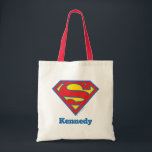 Tote Bag Logo classique Supergirl avec fond bleu<br><div class="desc">Superfille | Découvrez ce classique Supergirl S-Shield en rouge et jaune,  surligné en bleu !</div>