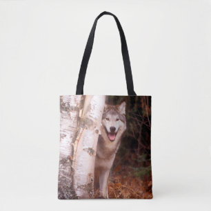 Tote Bag Loup gris derrière un arbre