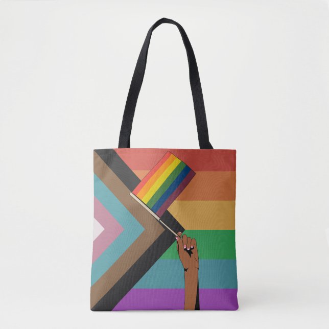 Tote Bag Main tenant un drapeau de la fierté (Devant)