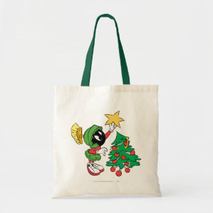 Tote Bag MARVIN LE MARTIEN™ mettant une étoile sur l'arbre