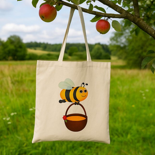 Tote Bag Mignonne Bee transportant un pot de miel avec fleu (Créateur téléchargé)