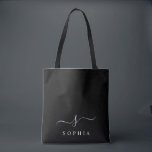 Tote Bag Monogramme élégant noir blanc minimaliste moderne<br><div class="desc">Personnalisez ce sac fourre-tout élégant avec votre monogramme initial. Le design présente un design de monogramme personnalisé simple dans une typographie minimaliste moderne classique en blanc sur fond noir. Facile à personnaliser. Parfait comme cadeau pour tous vos proches. Prenez-en un pour vous aussi.</div>