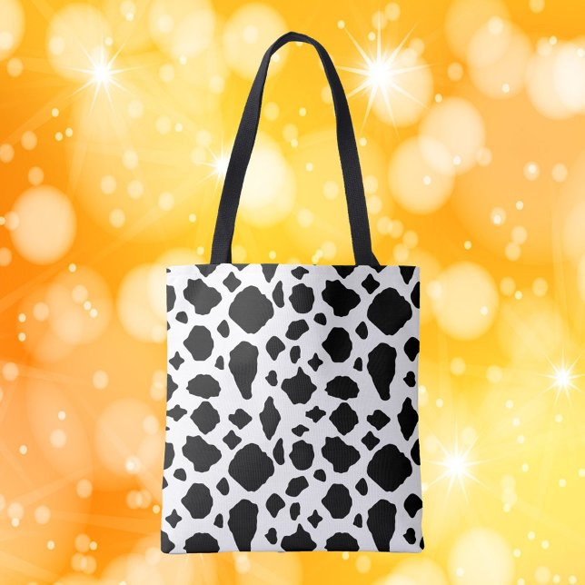 Tote Bag Motif Vache Noir et Blanc (A tote bag with a black and white cow pattern)