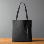Tote Bag Noir Blanc Moderne Minimaliste Élégant Monogramme<br><div class="desc">Découvrez notre collection minimaliste moderne de monogrammes noirs et blancs : Faites preuve de simplicité et de sophistication grâce à nos designs minimalistes, conçus pour élever votre style sans effort. Réalisée avec un oeil attentif pour l'esthétique moderne, cette collection présente des motifs noirs et blancs épurés accentués par des monogrammes...</div>
