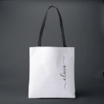 Tote Bag Noir Nom White Girl Script Monogramme moderne<br><div class="desc">Black and White Elegant Ajoutez Votre Propre Nom Monogram Book Bag. Ce sac de livre peut être customisé pour inclure votre nom initial et prénom et donné comme cadeau pour Noël,  Sweet 16 Anniversaire,  Fête des mariées ou un Mariage.</div>