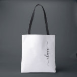 Tote Bag Noir Nom White Girl Script Monogramme moderne<br><div class="desc">Black and White Elegant Ajoutez Votre Propre Nom Monogram Book Bag. Ce sac de livre peut être customisé pour inclure votre nom initial et prénom et donné comme cadeau pour Noël,  Sweet 16 Anniversaire,  Fête des mariées ou un Mariage.</div>