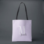 Tote Bag Nom simple personnalisé et monogramme violet<br><div class="desc">Élégant monogramme moderne personnalisé et sacs fourre-tout de nom en noir,  blanc et lavande couleur violet,  simple et élégant. cadeaux de mariage personnalisés lors d'une fête de mariage,  d'une douche nuptiale ou d'une fête de bachelorette.  Customisez la couleur arrière - plan de votre choix.</div>