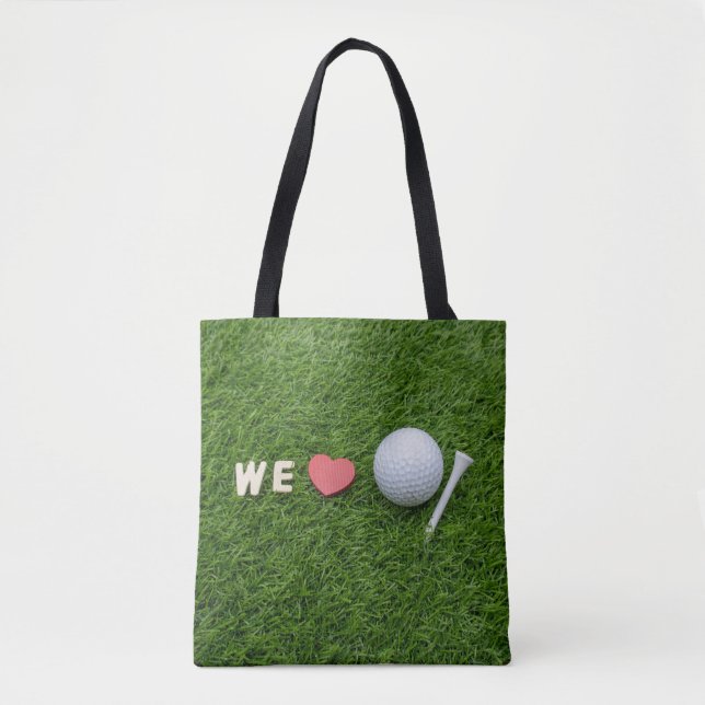 Tote Bag Nous aimons le golf avec une balle de golf et un t (Devant)