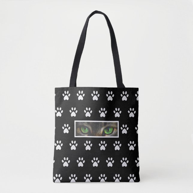 Tote Bag Oeil de chat élégant et motif de pattes sur noir & (Devant)