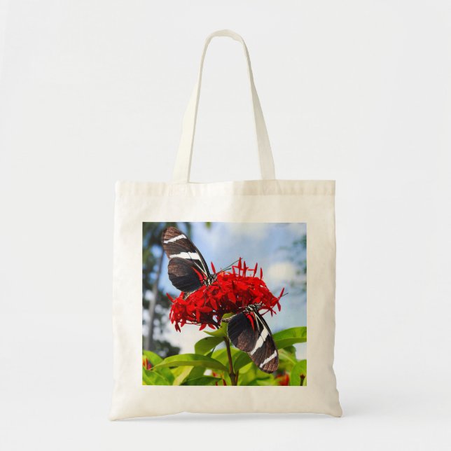 Tote Bag Papillons à ailes longues zébrées sur fleurs rouge (Devant)