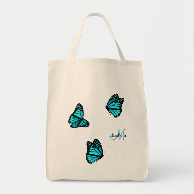 Tote Bag papillons turquoise flottant sur une brise (Devant)