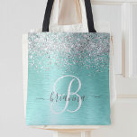 Tote Bag Parties scintillant argentée turquoise en métal br<br><div class="desc">Personnalisez facilement ce design sac fourre-tout chic branché avec une jolie parties scintillant brillante en argent sur un arrière - plan métallique brossé turquoise.</div>